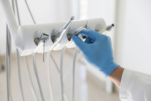 Professional Emergency Dentist technician working in Denver, CO